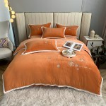 2022 new style jacquard milk velvet embroidery four-piece set with cut flowers solid color waffle velvet Ruixueji orange